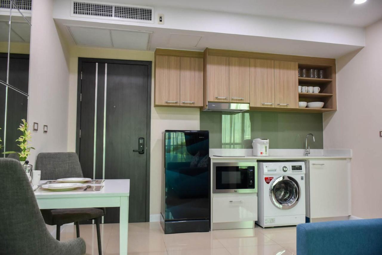 Dusit Grand Condo View Джомтиен Бийч Стая снимка