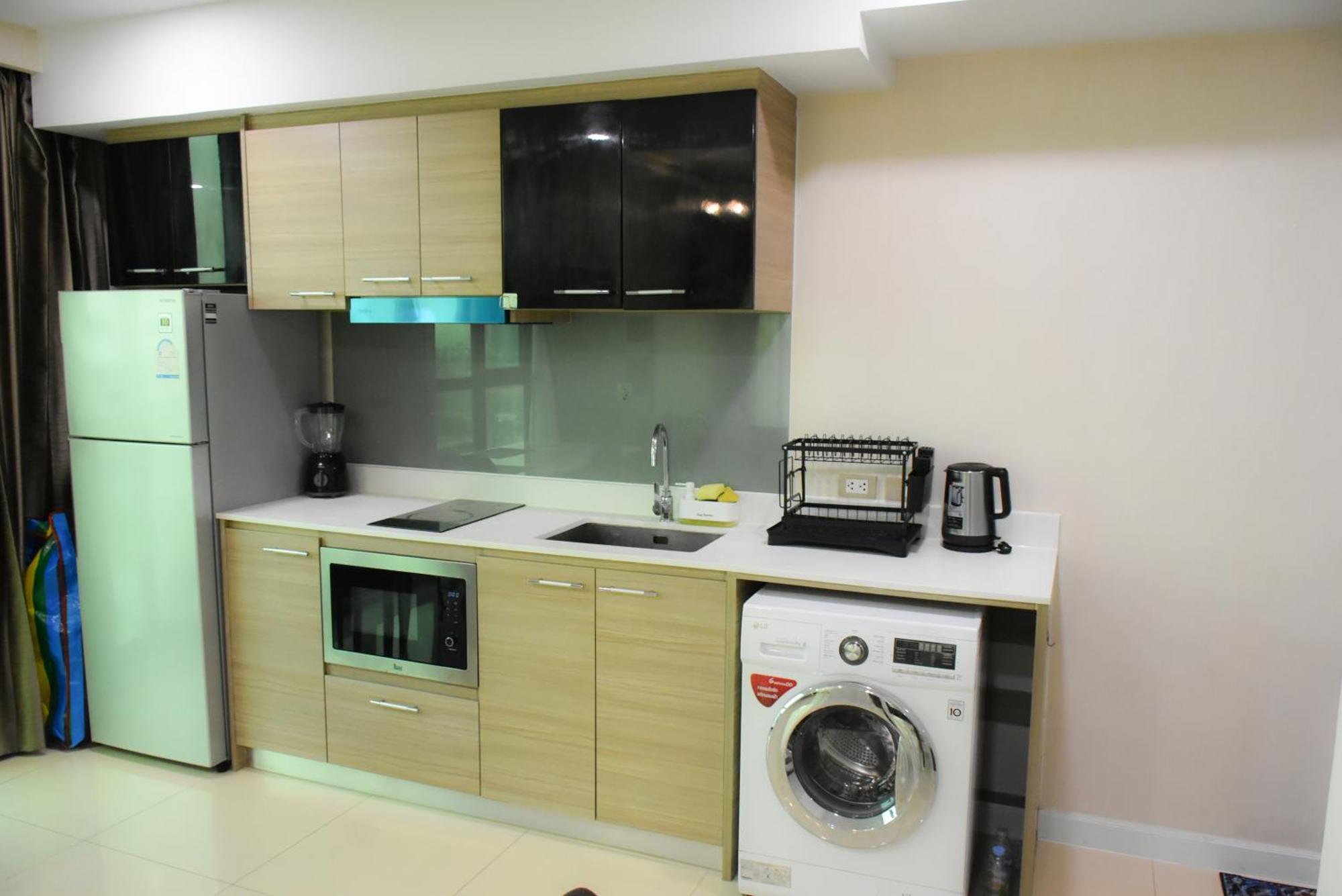 Dusit Grand Condo View Джомтиен Бийч Стая снимка