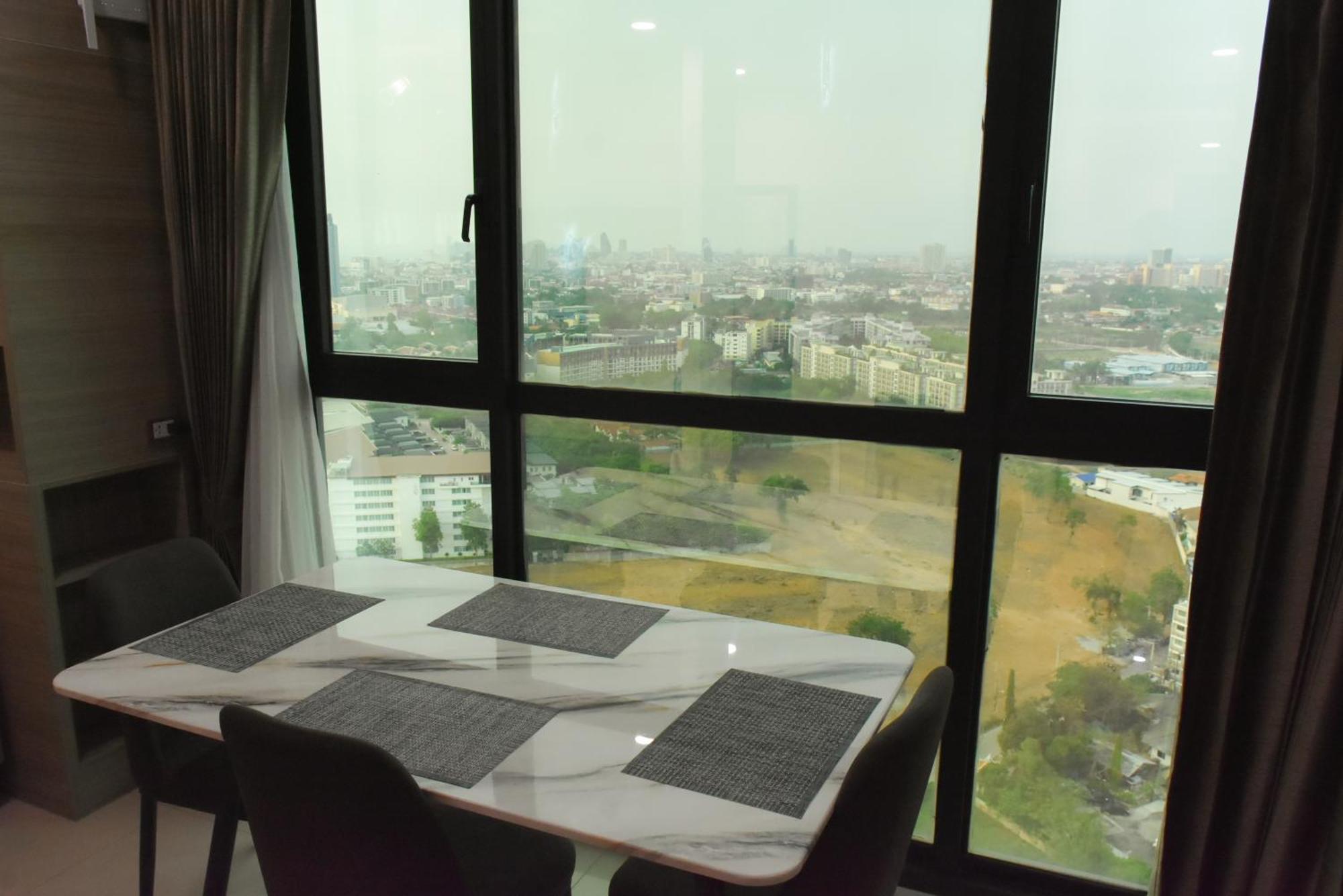 Dusit Grand Condo View Джомтиен Бийч Стая снимка