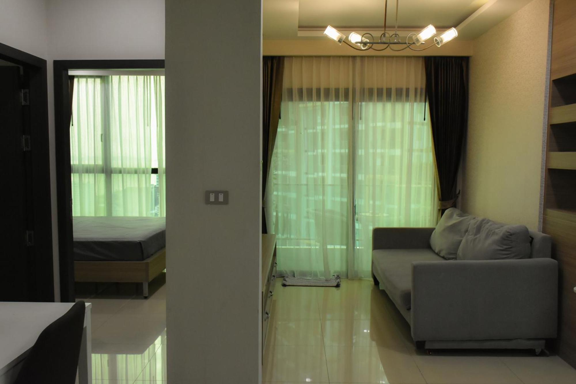 Dusit Grand Condo View Джомтиен Бийч Стая снимка