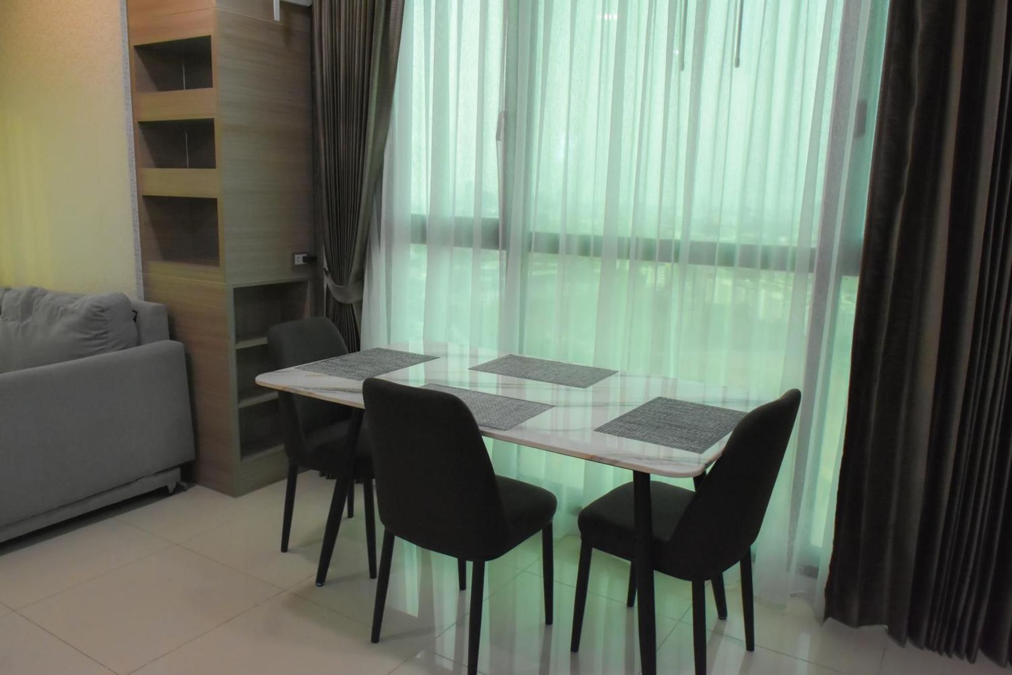 Dusit Grand Condo View Джомтиен Бийч Стая снимка