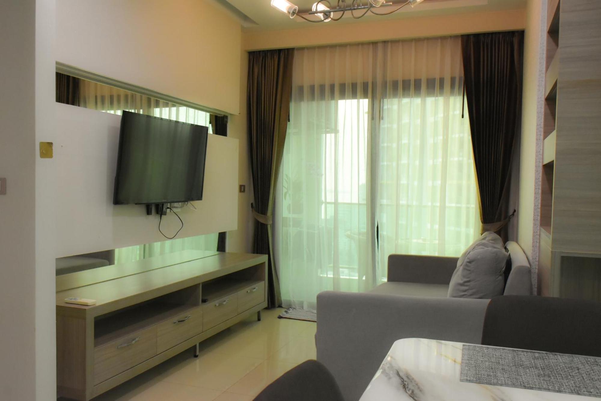 Dusit Grand Condo View Джомтиен Бийч Стая снимка