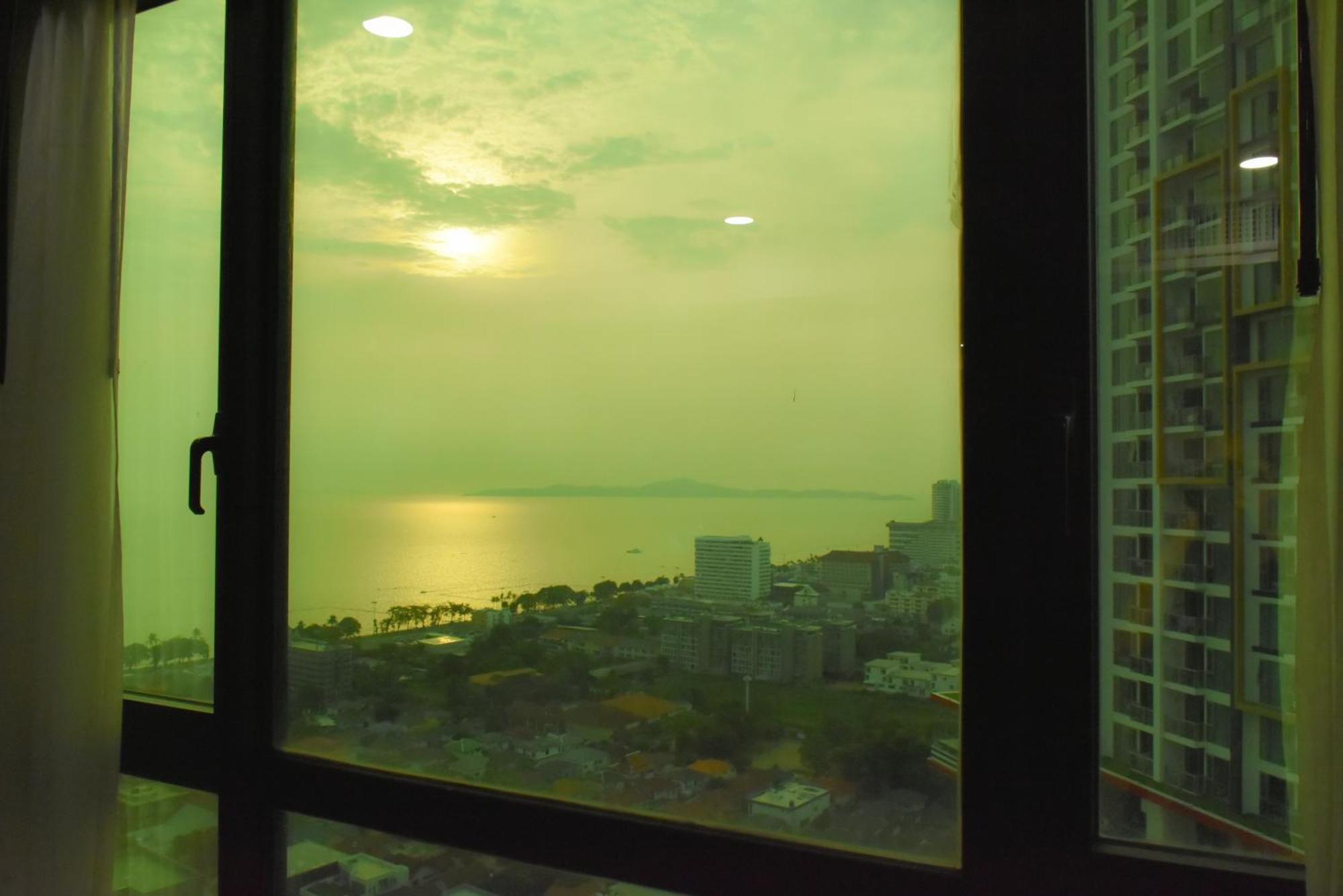 Dusit Grand Condo View Джомтиен Бийч Стая снимка