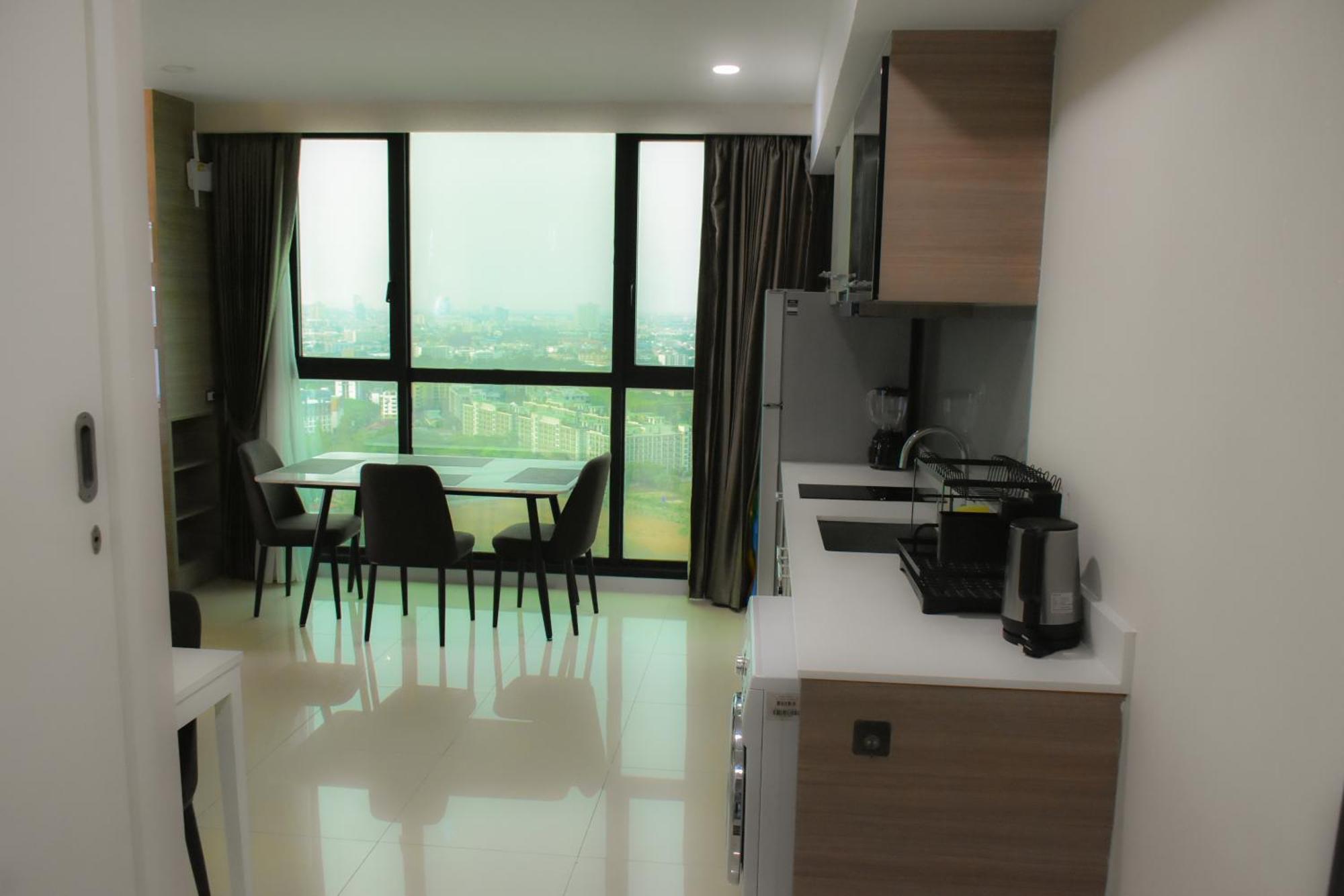 Dusit Grand Condo View Джомтиен Бийч Стая снимка