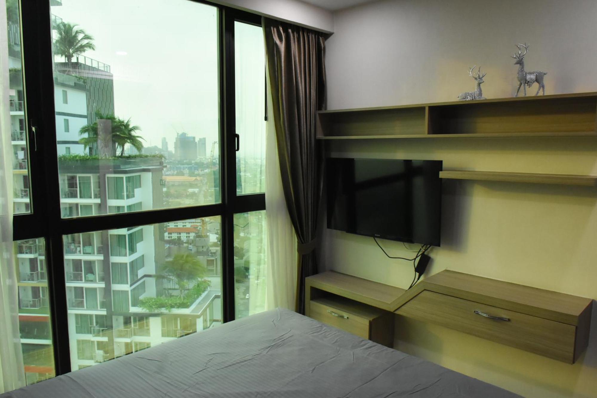 Dusit Grand Condo View Джомтиен Бийч Стая снимка